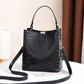Sac à bandoulière effet croco
